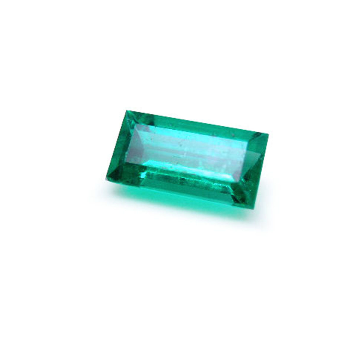 1.62 ct. Fine baguette cut loose natural colombian emerald, left side table and crown visibles