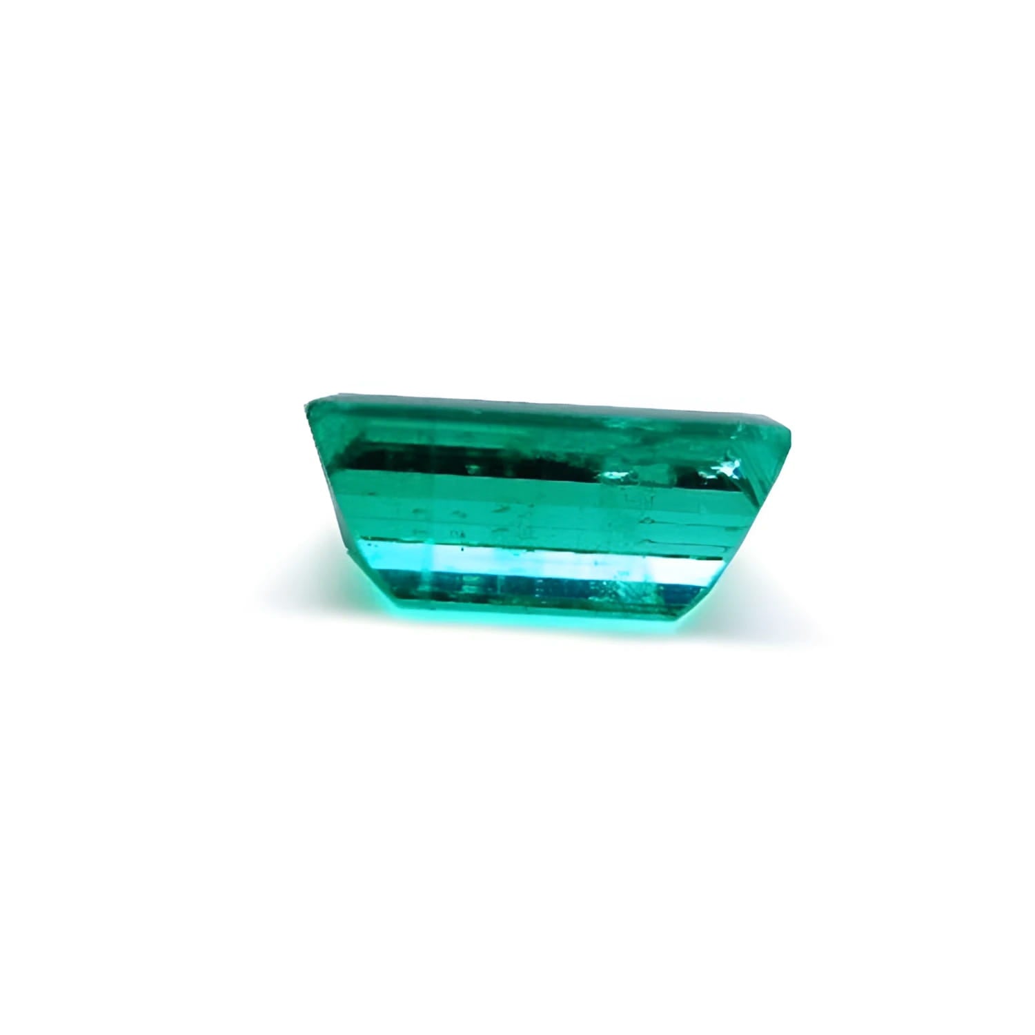 1.62 ct. natural Colombian Muzo emerald, baguette cut, vibrant green, loose gemstone.