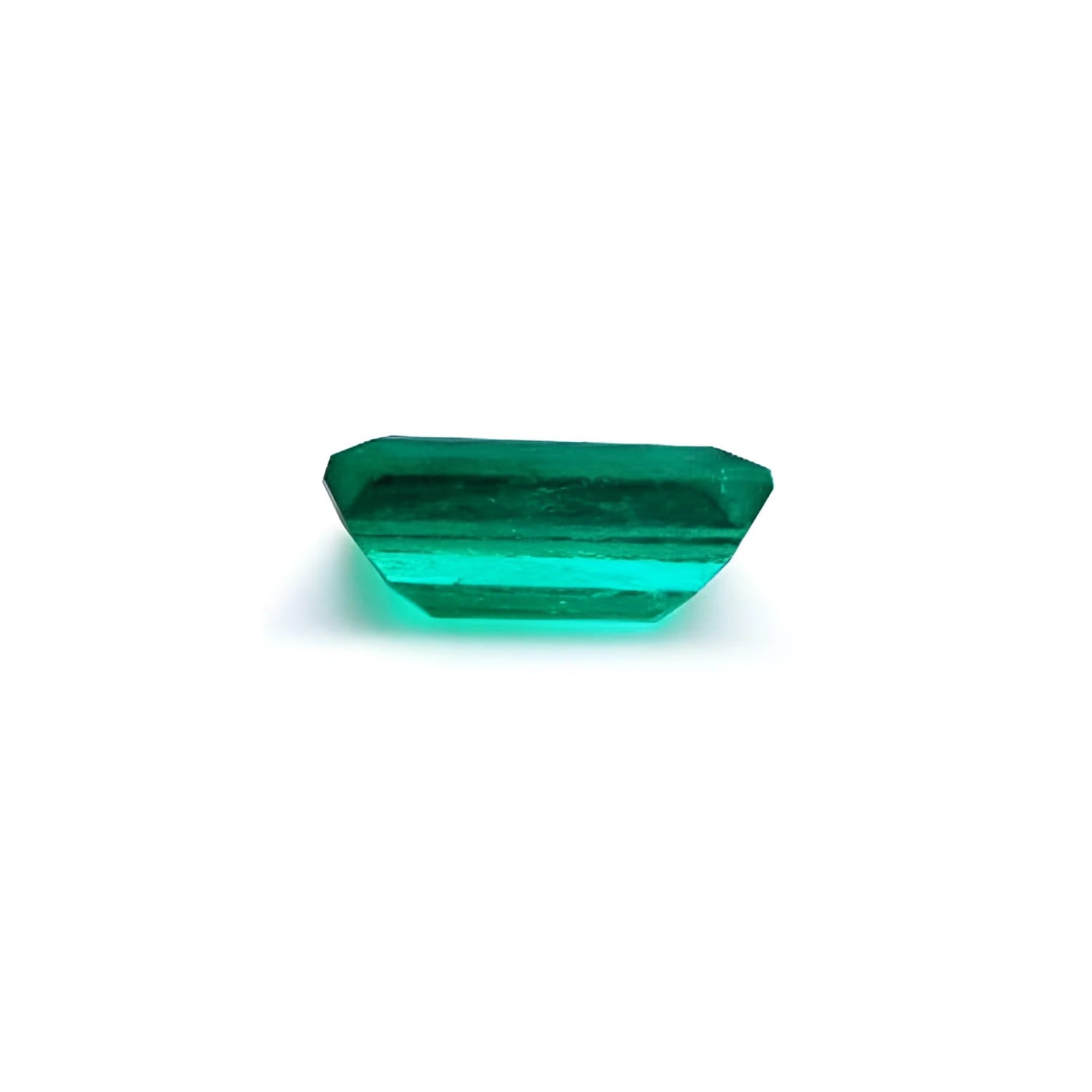 1.10 ct. baguette cut loose Colombian emerald, vibrant green with lively brilliance.