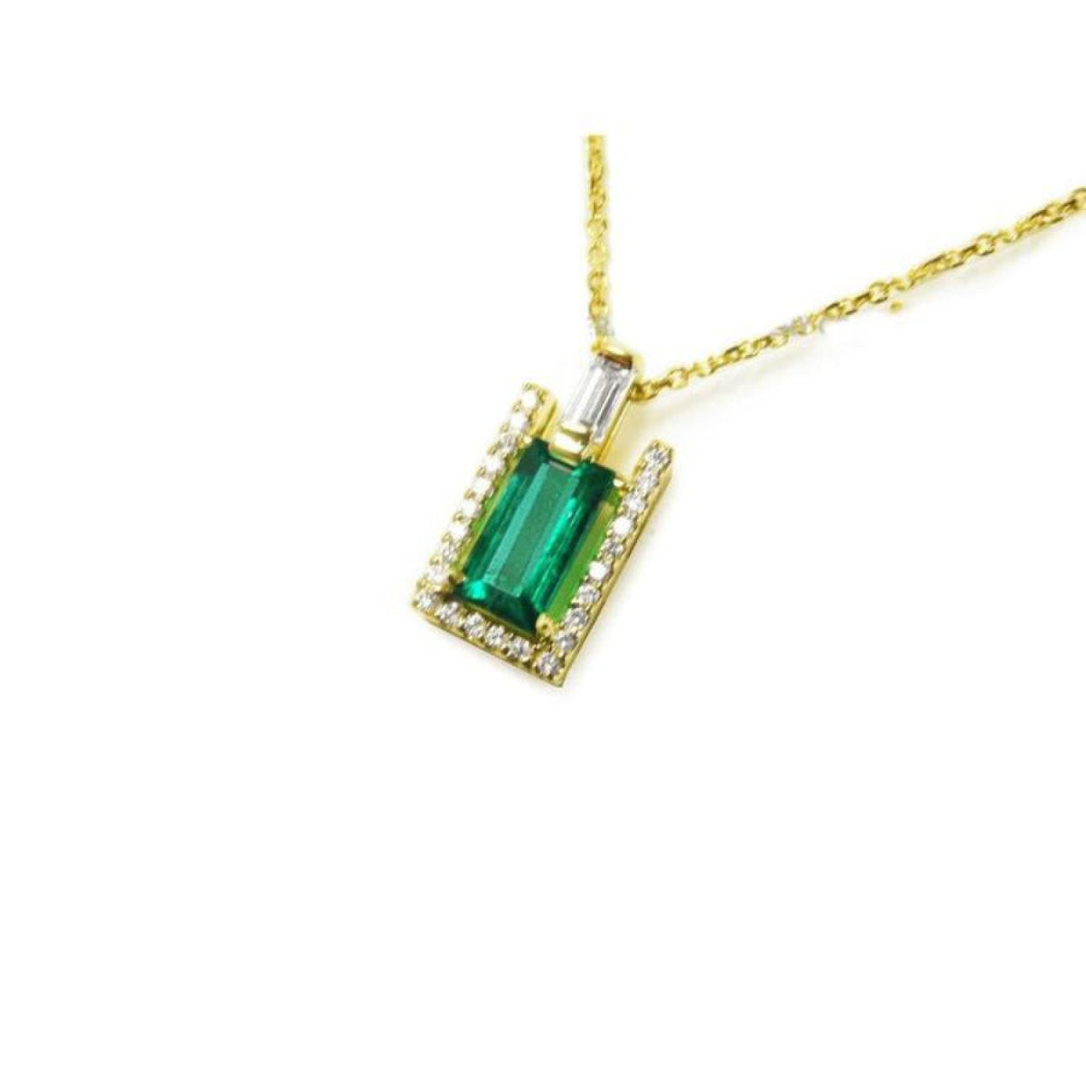 14K yellow gold baguette emerald pendant with diamond halo and bail on a delicate chain.