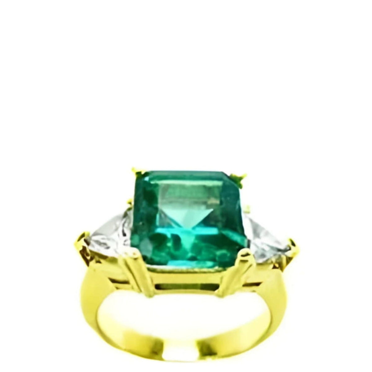 The best place to buy a colombian emerald ring for women in 18k yellow gold with trillion side diamonds.