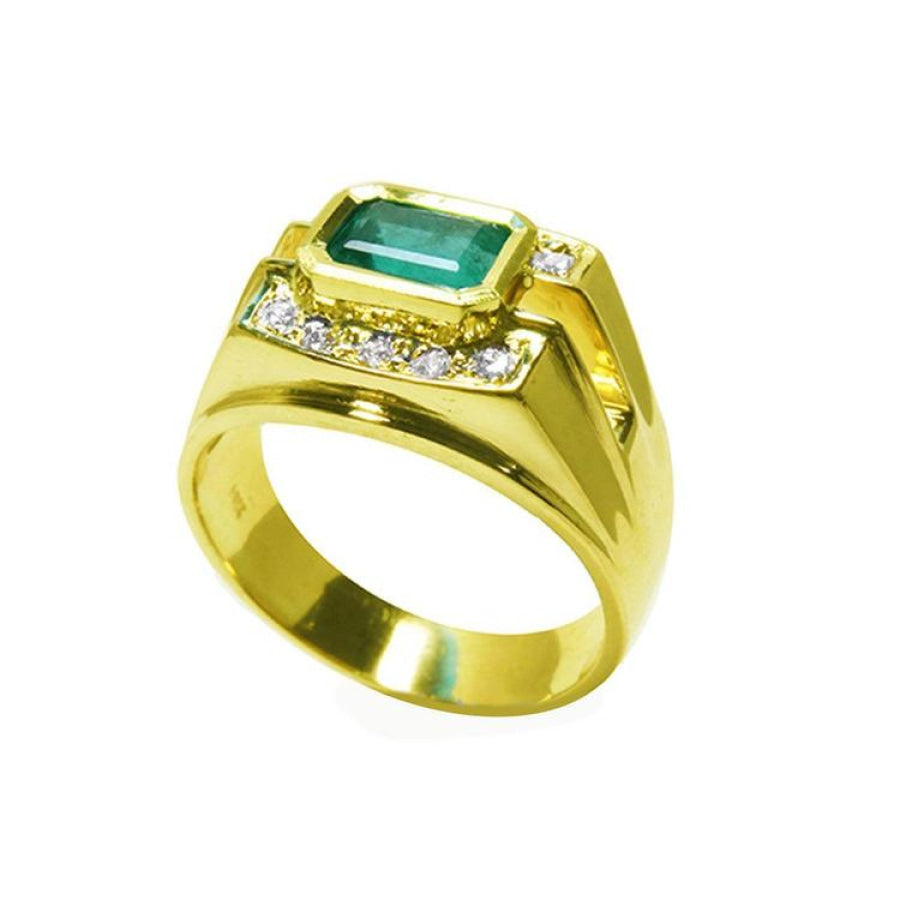 14K yellow gold men's ring with a 1.21 ct. emerald in an east-west bezel setting and diamond accents.