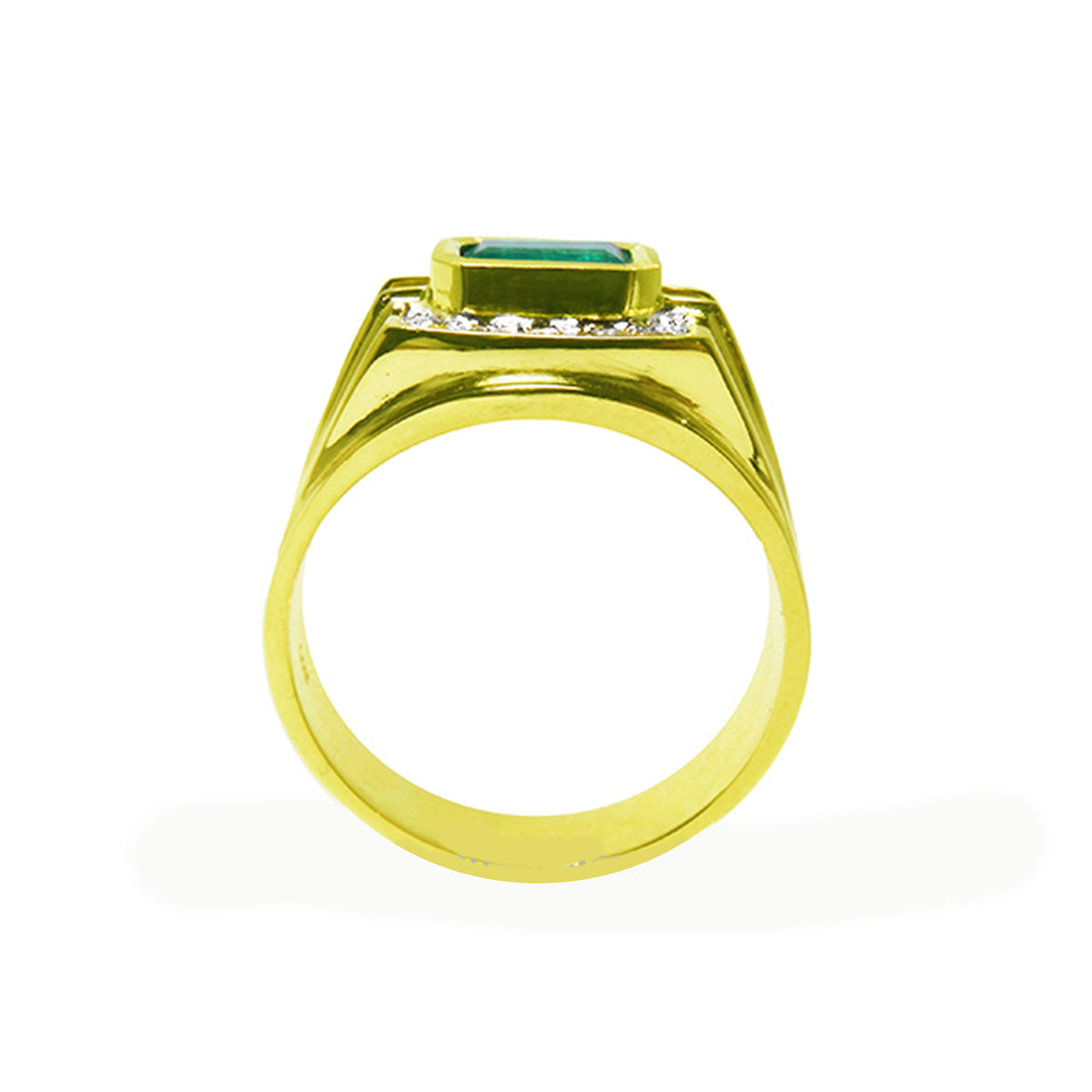 A yellow gold mens colombian emerald ring on a lateral side view.