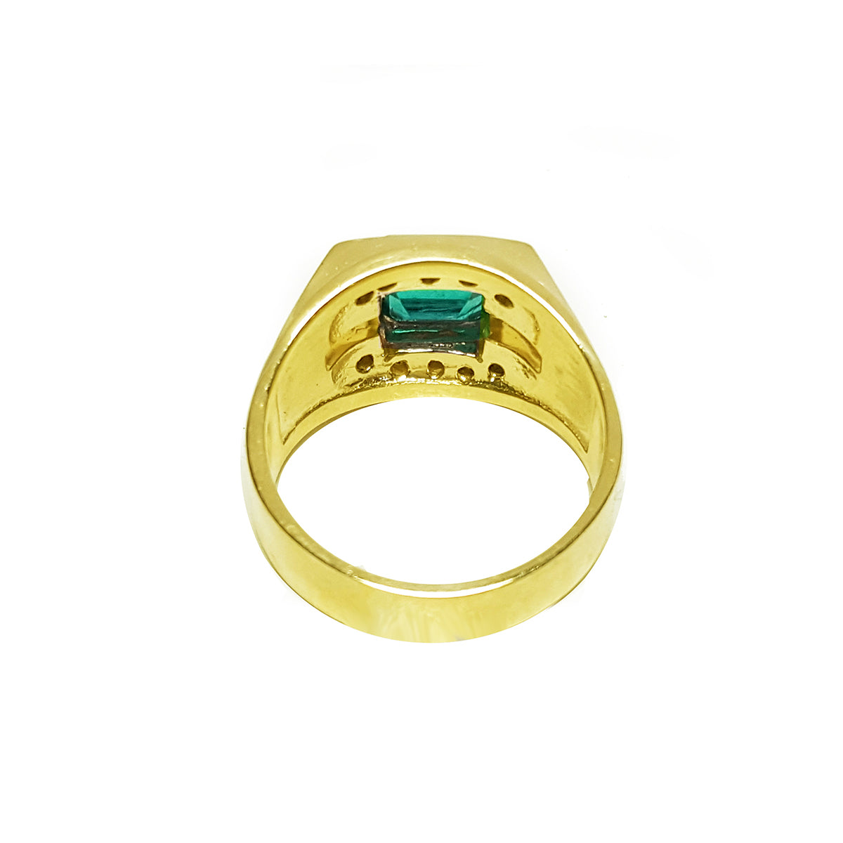 The underside view of a men&#39;s emerald ring in yellow gold.