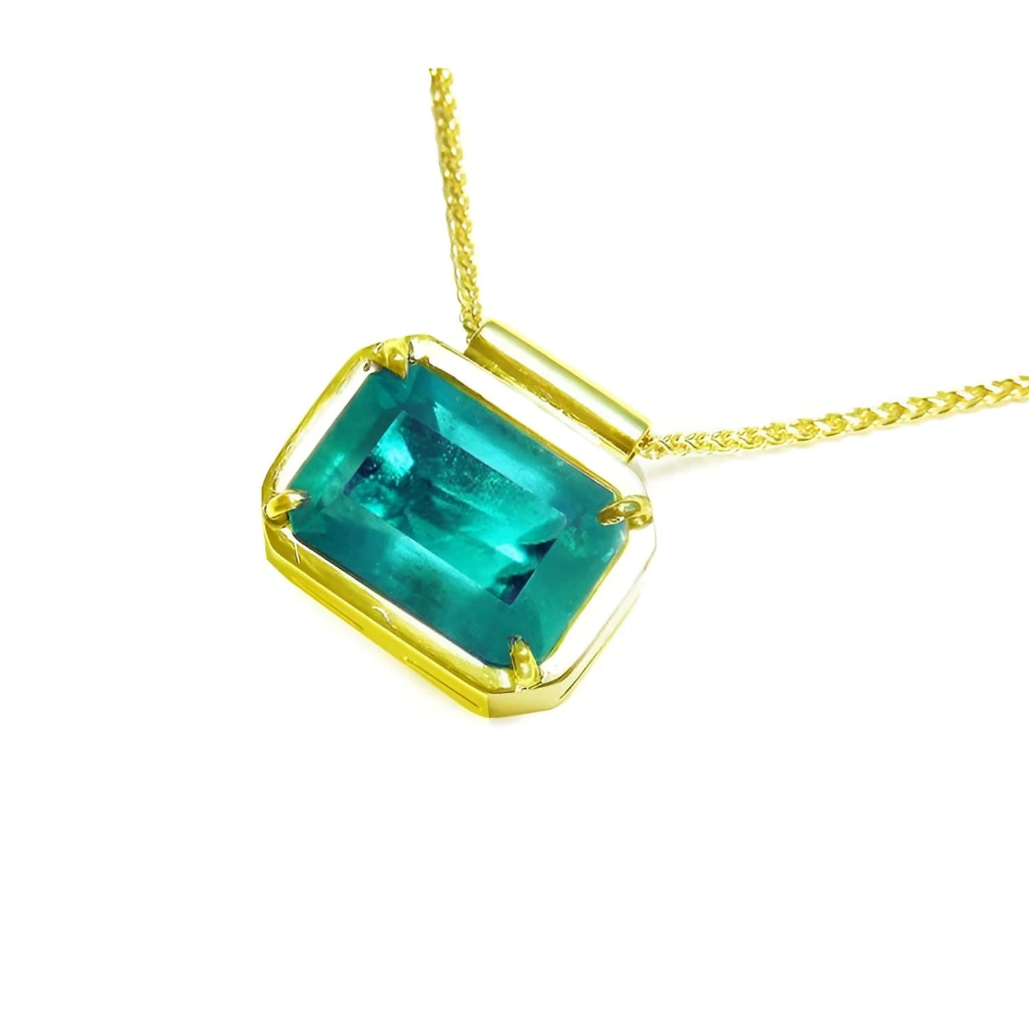 Natural Muzo Colombian emerald solitaire in 18K yellow gold, east-west orientation.