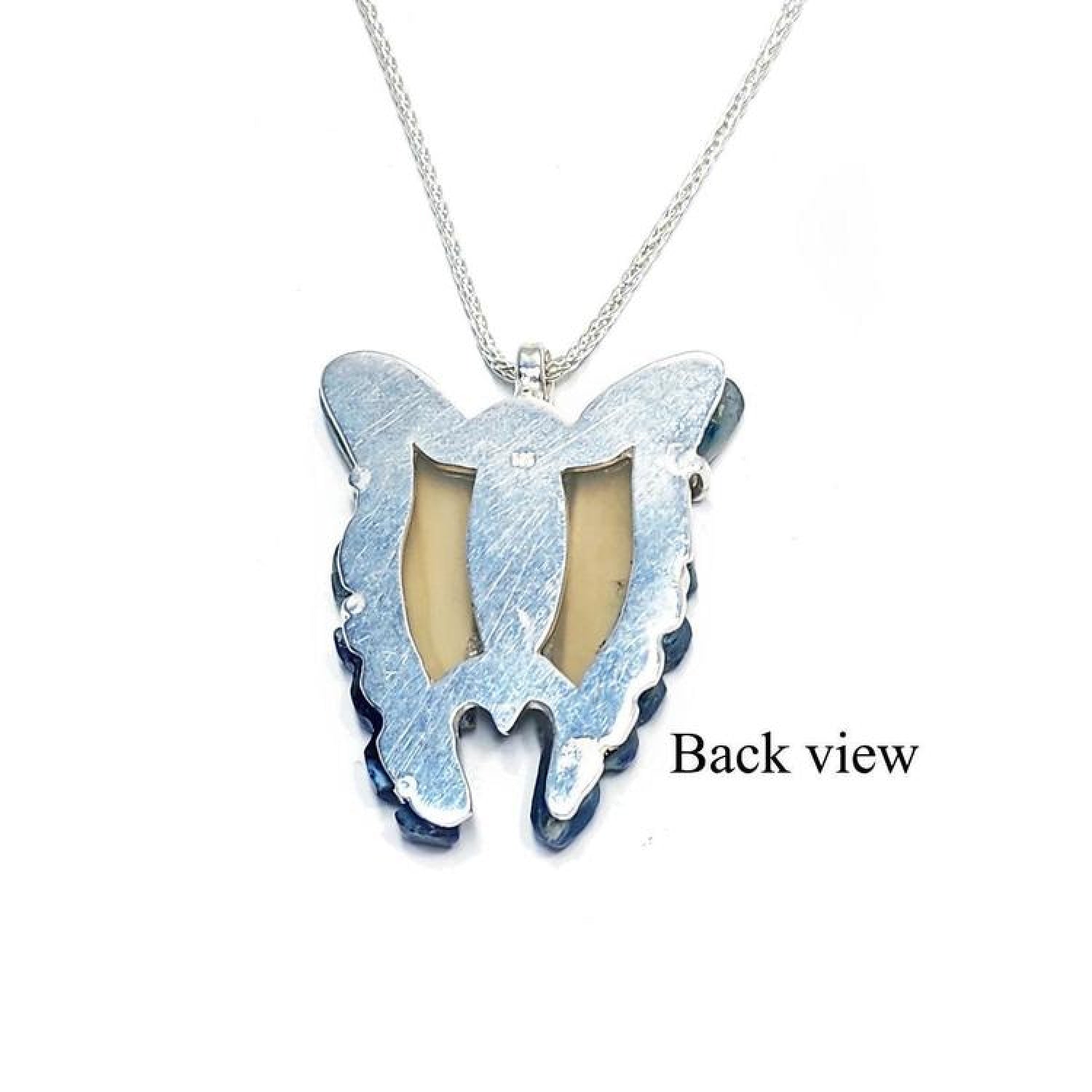 Back view of a natural blue agate butterfly pendant necklace with a sterling silver frame.