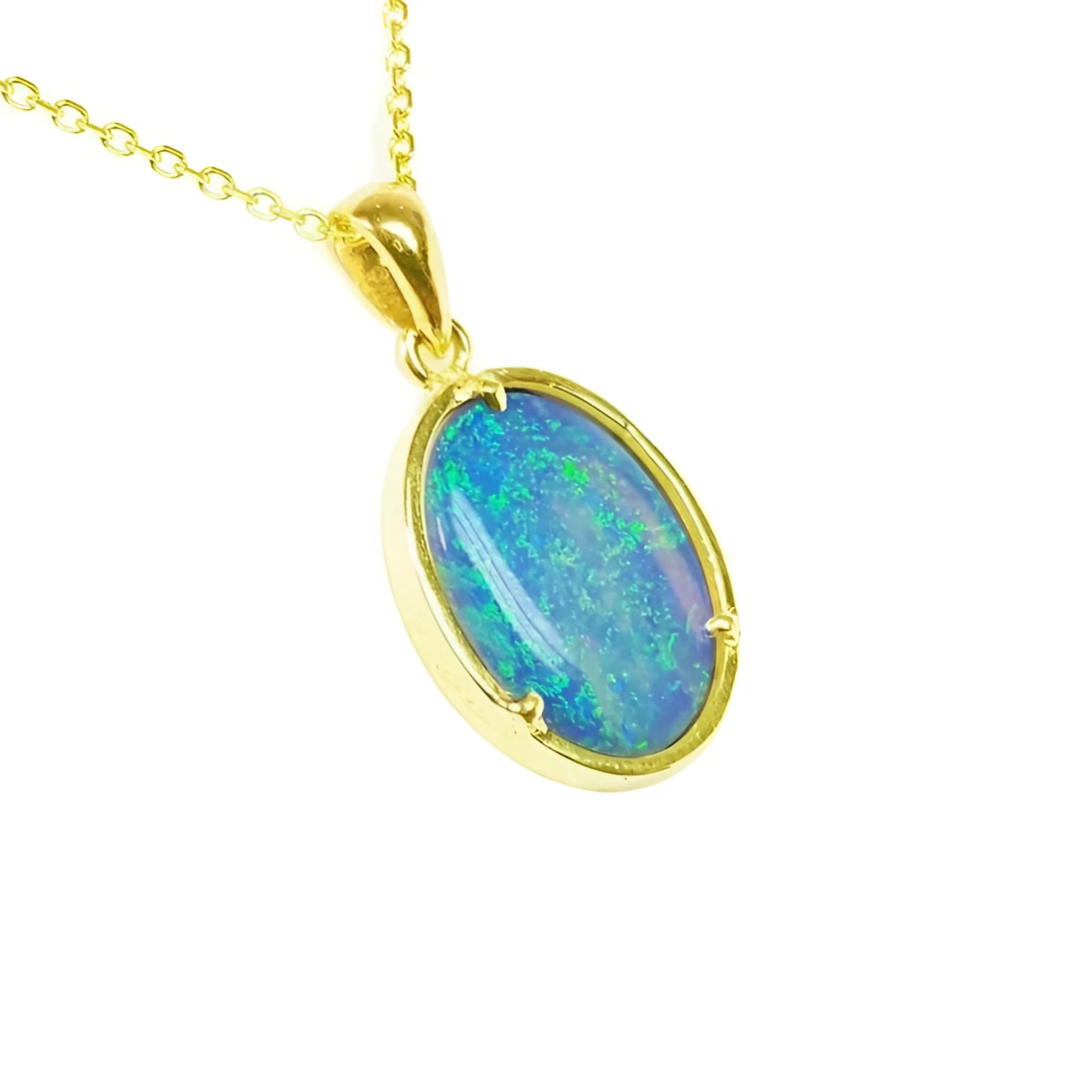 Oval 3.43 ct Australian opal pendant with blue-green sparks, handcrafted in 14K yellow gold.