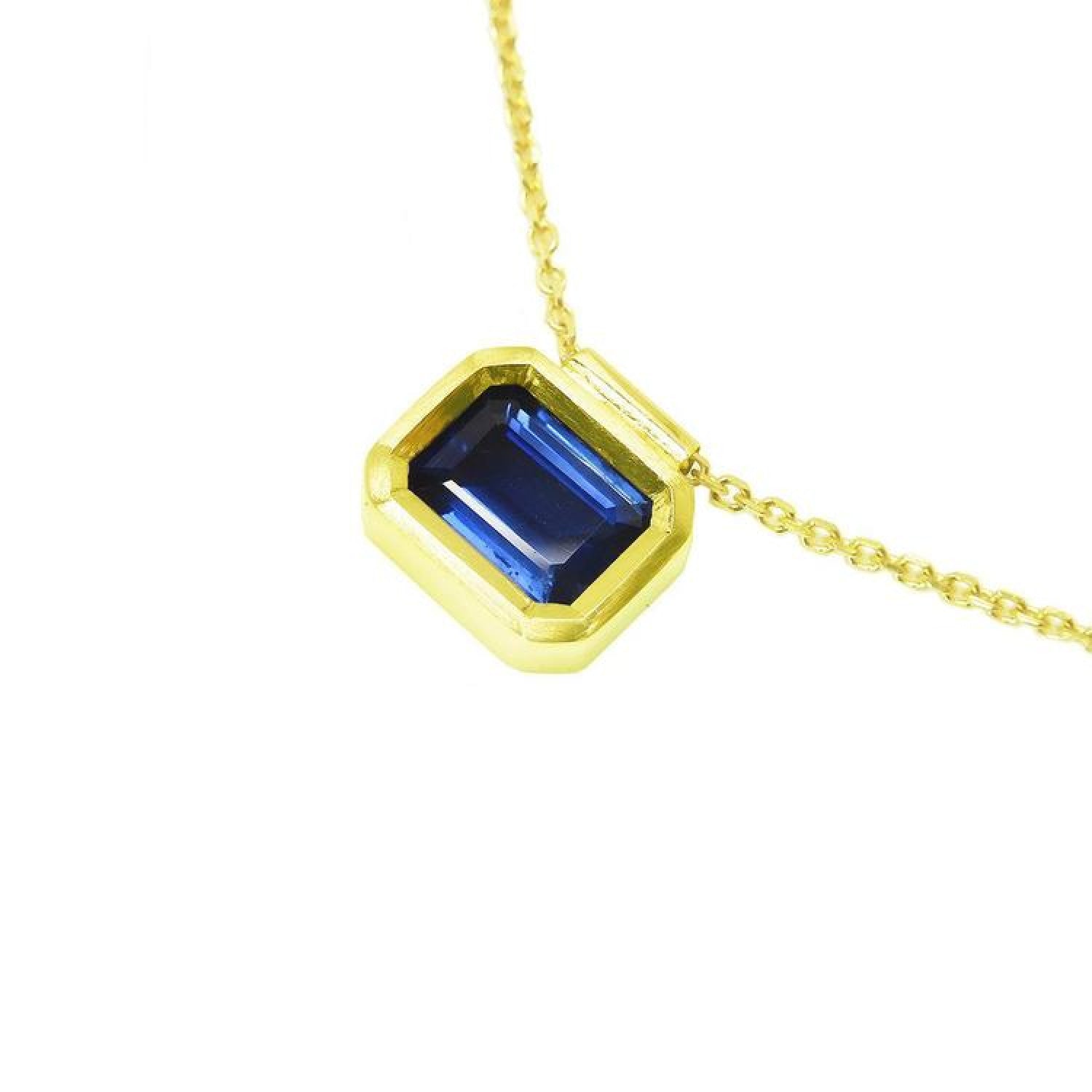 1.01 ct blue sapphire choker in a bezel setting on a 14K gold cable chain.