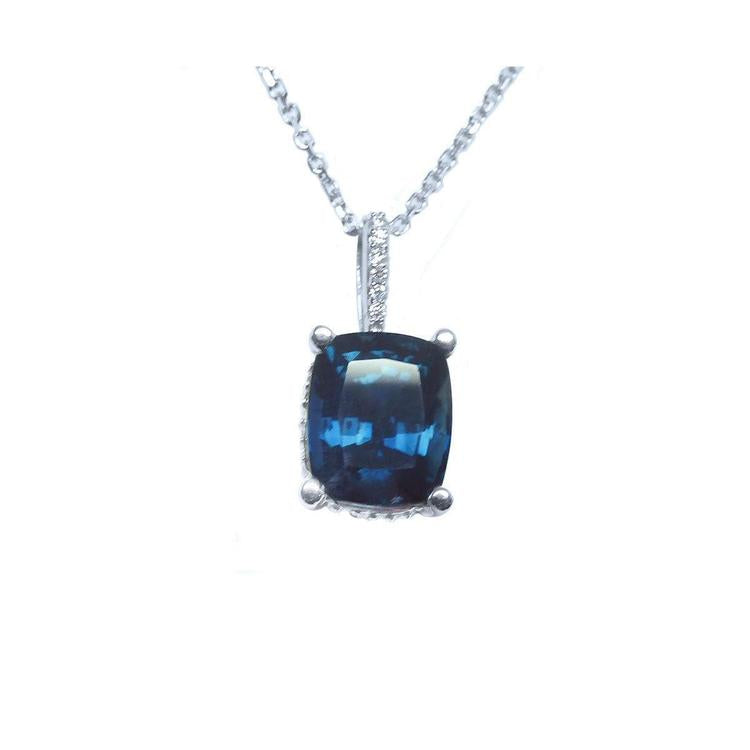 Front position top view of a blue sapphire necklace cushion cut slider pendant 14k white gold.