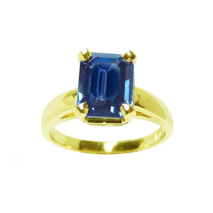 Blue sapphire solitaire ring for women emerald cut 14k yellow gold, front side top full view