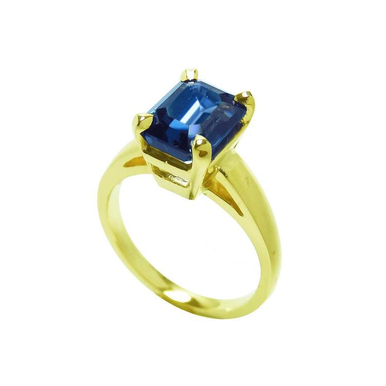 Blue sapphire solitaire ring for women emerald cut 14k yellow gold, half tall lateral view