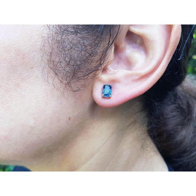 Solitaire natural sapphire stud earrings 14k white gold, lady's lifestyle view
