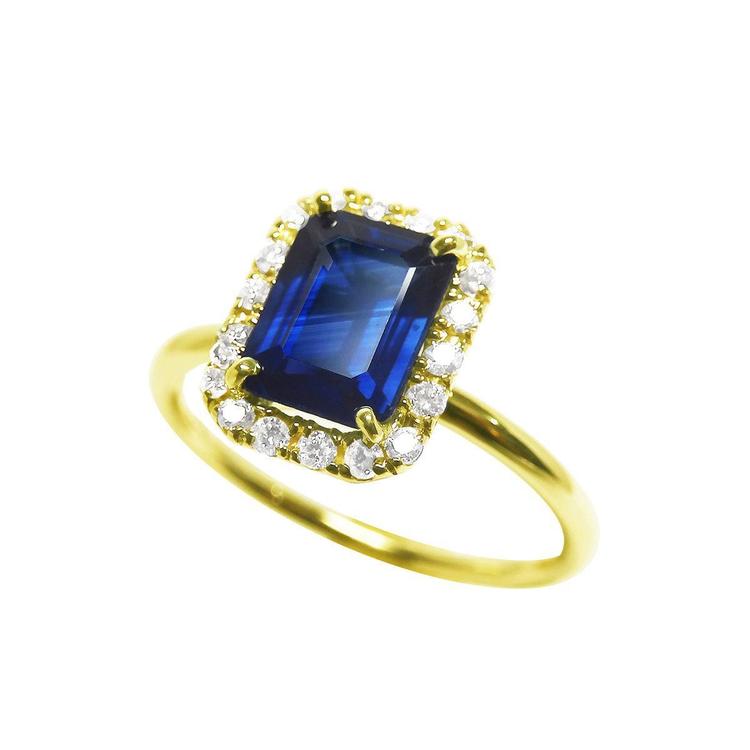 Women's natural blue sapphire ring halo diamond in 14k yellow gold, tilted top view down shank profile