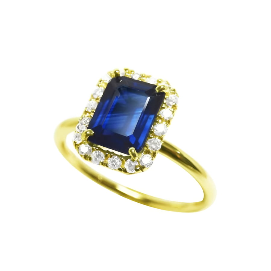 Women's 14k yellow gold ring with emerald cut natural blue sapphire and diamond halo.
