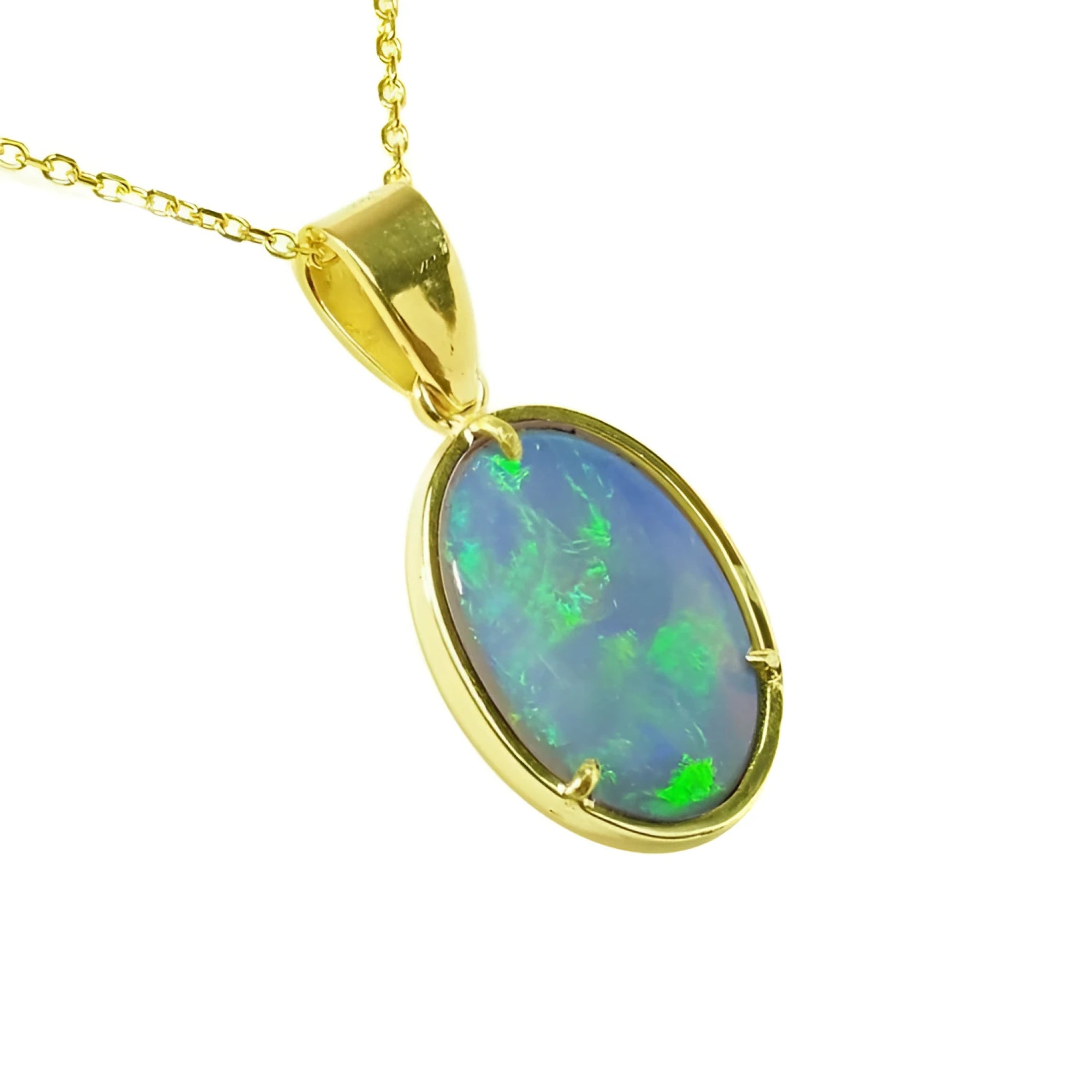 Oval bluish-green Australian opal pendant in 14K yellow gold with three prongs.