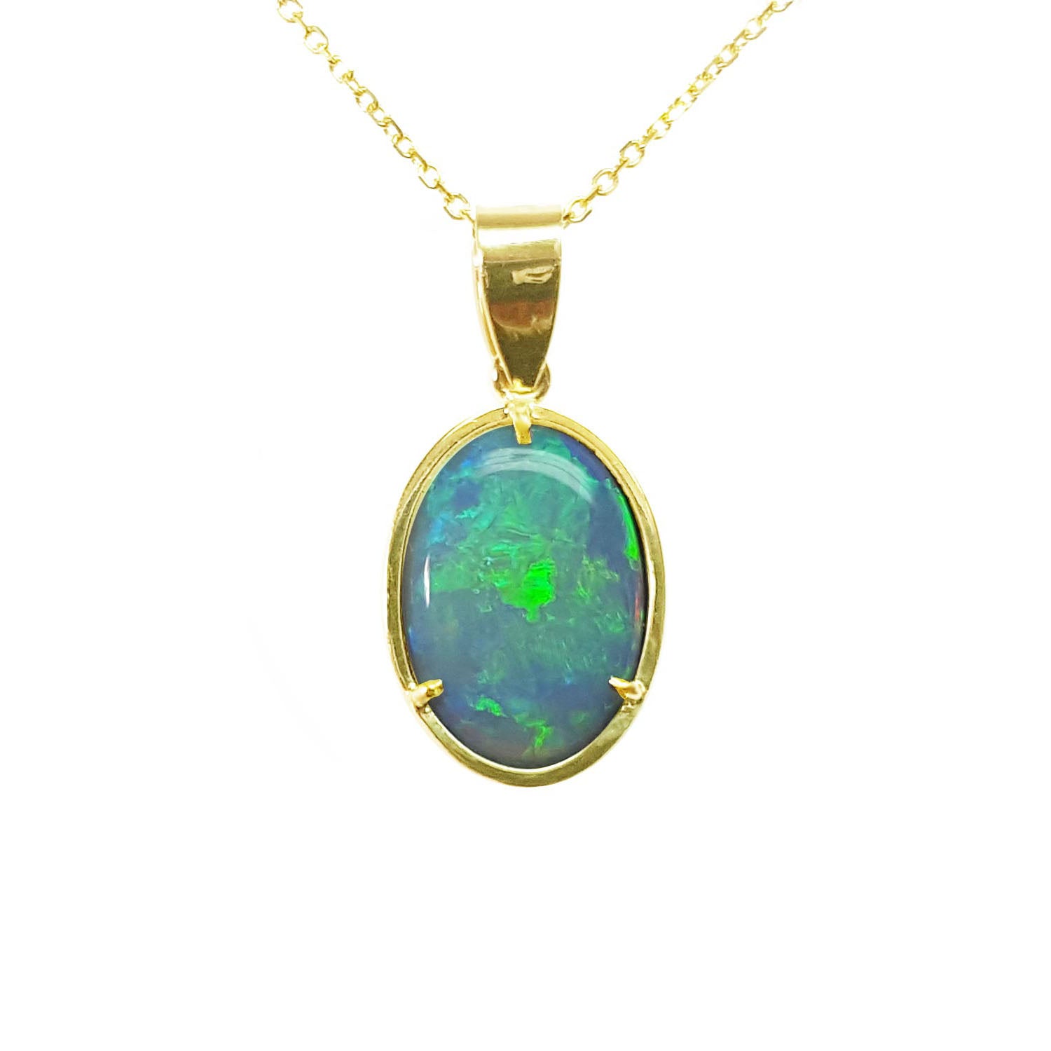 Opal pendant with gold frame on a topside view position.