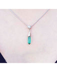 Colombian emerald briolette necklace with a diamond slider on a 14K white gold chain.