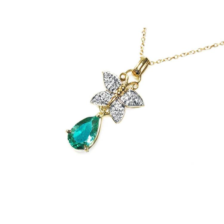 Gold necklace with a colombian teardrop emerald and butterfly pendant on a left-side position, topside visible.