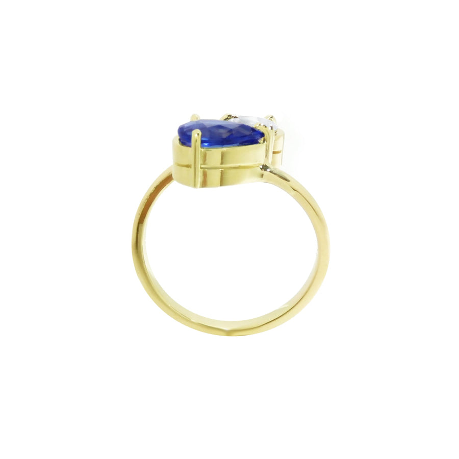 Two-stone "You and Me" blue natural sapphire and diamond bypass ring, this 1.20 ct. design celebrates dual elegance with its distinctive twisted-band silhouette.