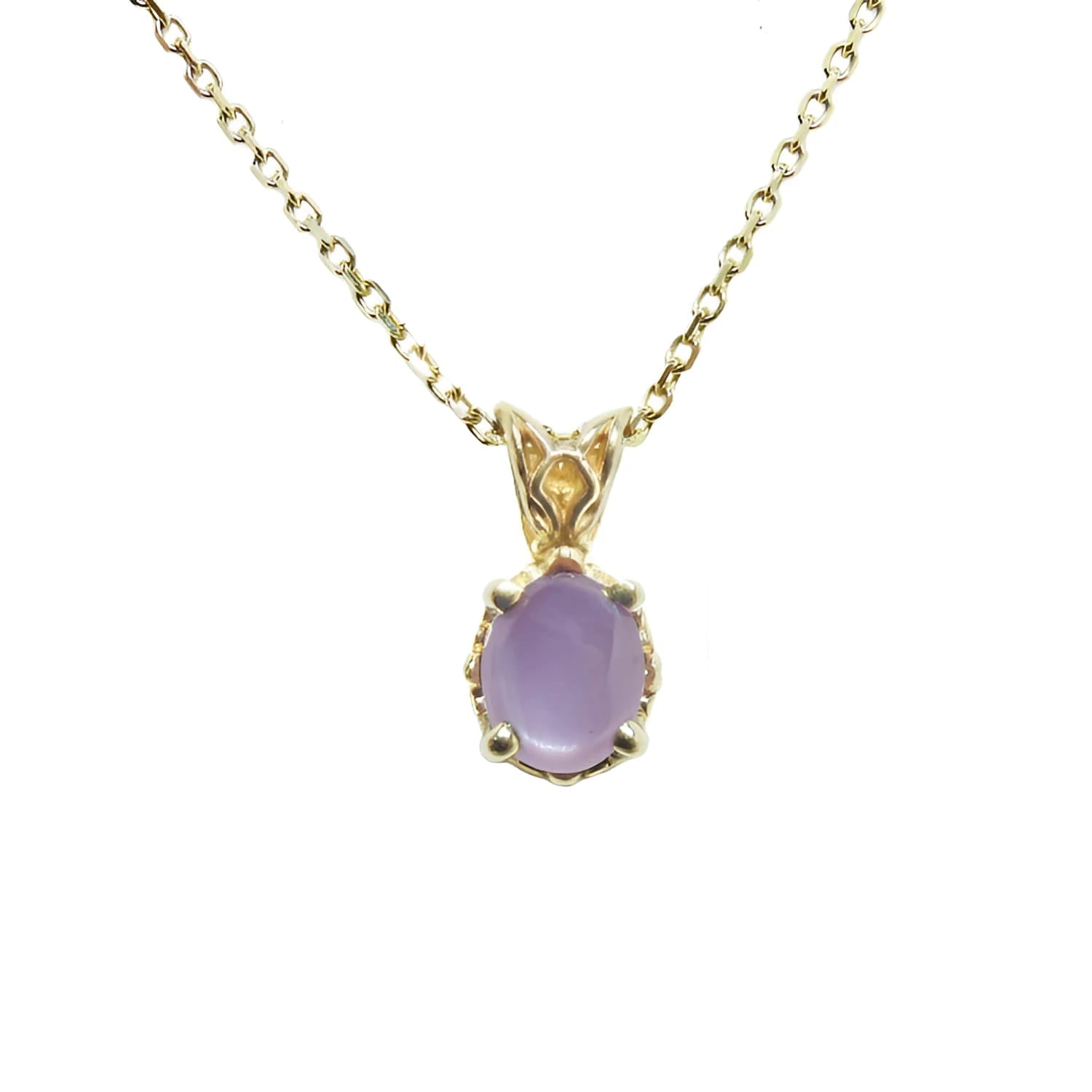 An oval-cut solitaire cabochon pink sapphire pendant necklace showcasing a 1.30 ct stone with a medium sparkle hue. 