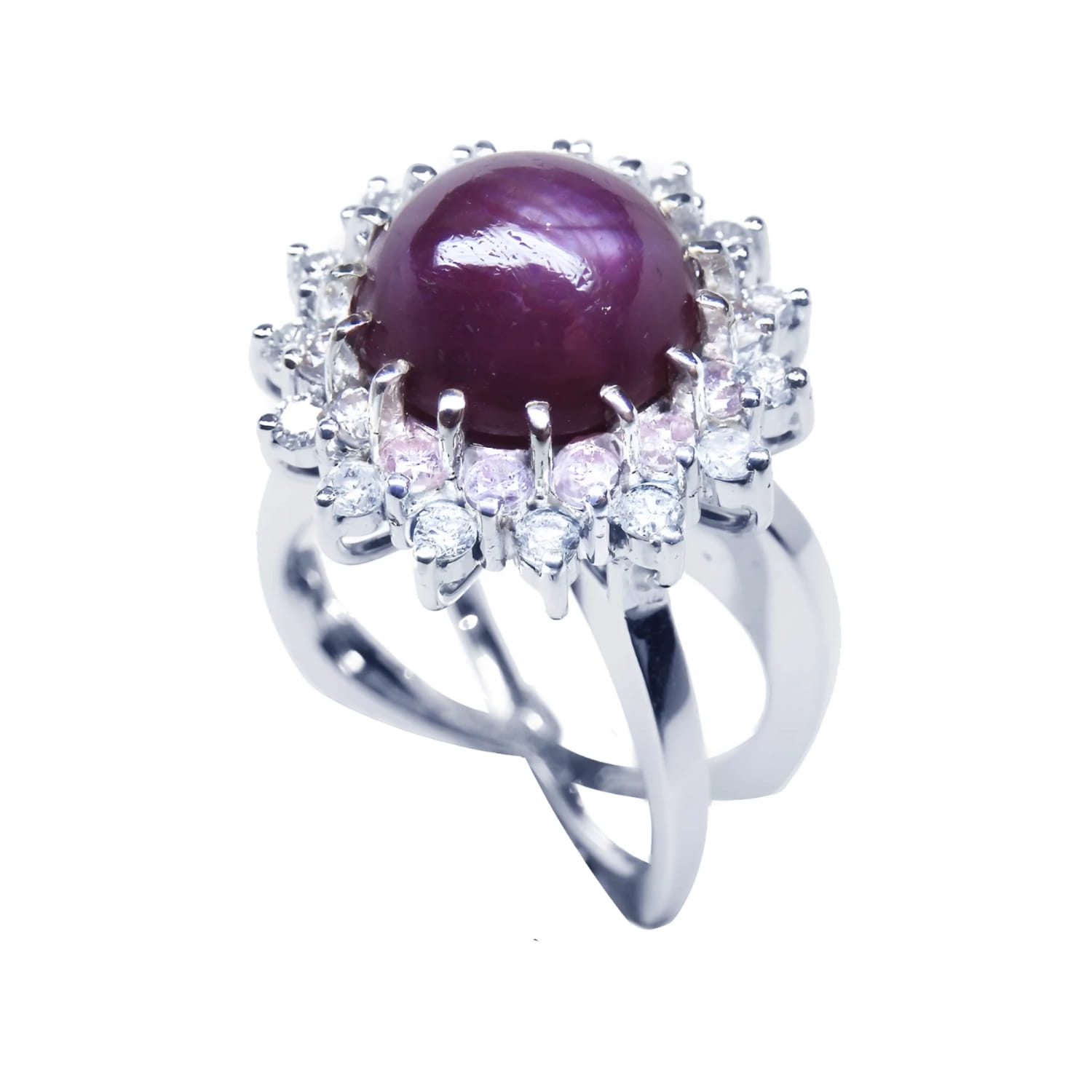 Red purple cabochon star ruby women's ring top side view in a double halo natural diamonds