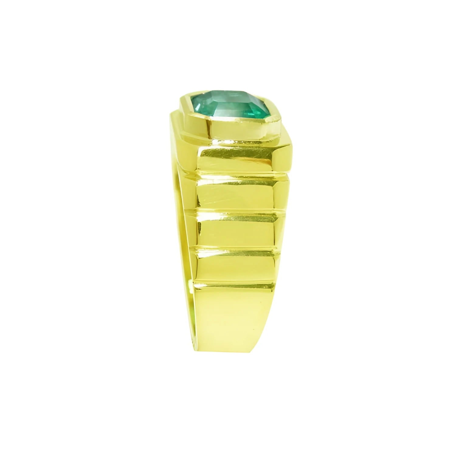 Men's 18K yellow gold ring with a rectangular, medium-deep green emerald in a full bezel setting.