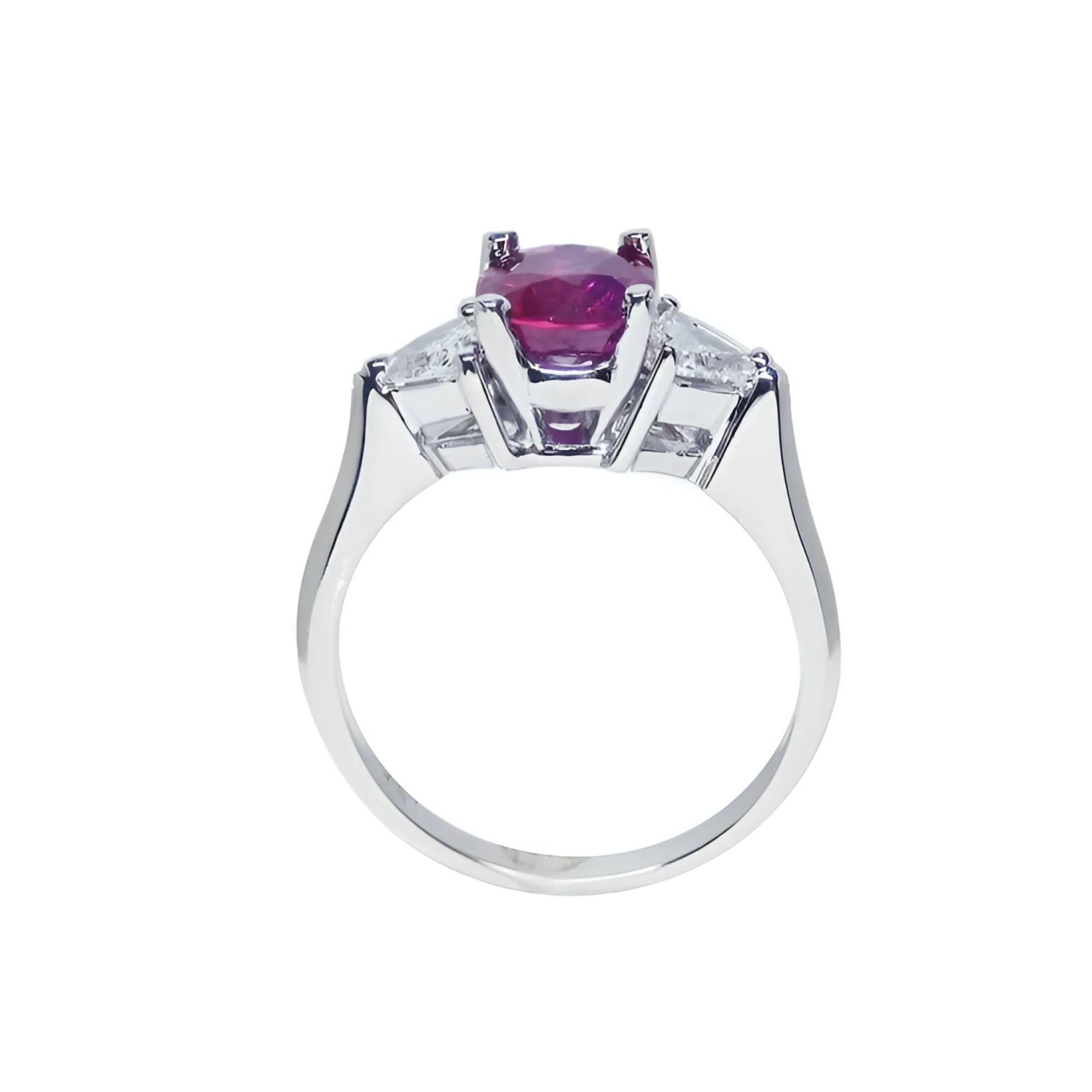 Women's 14k white gold ring with a deep red ruby and trillion side diamonds.