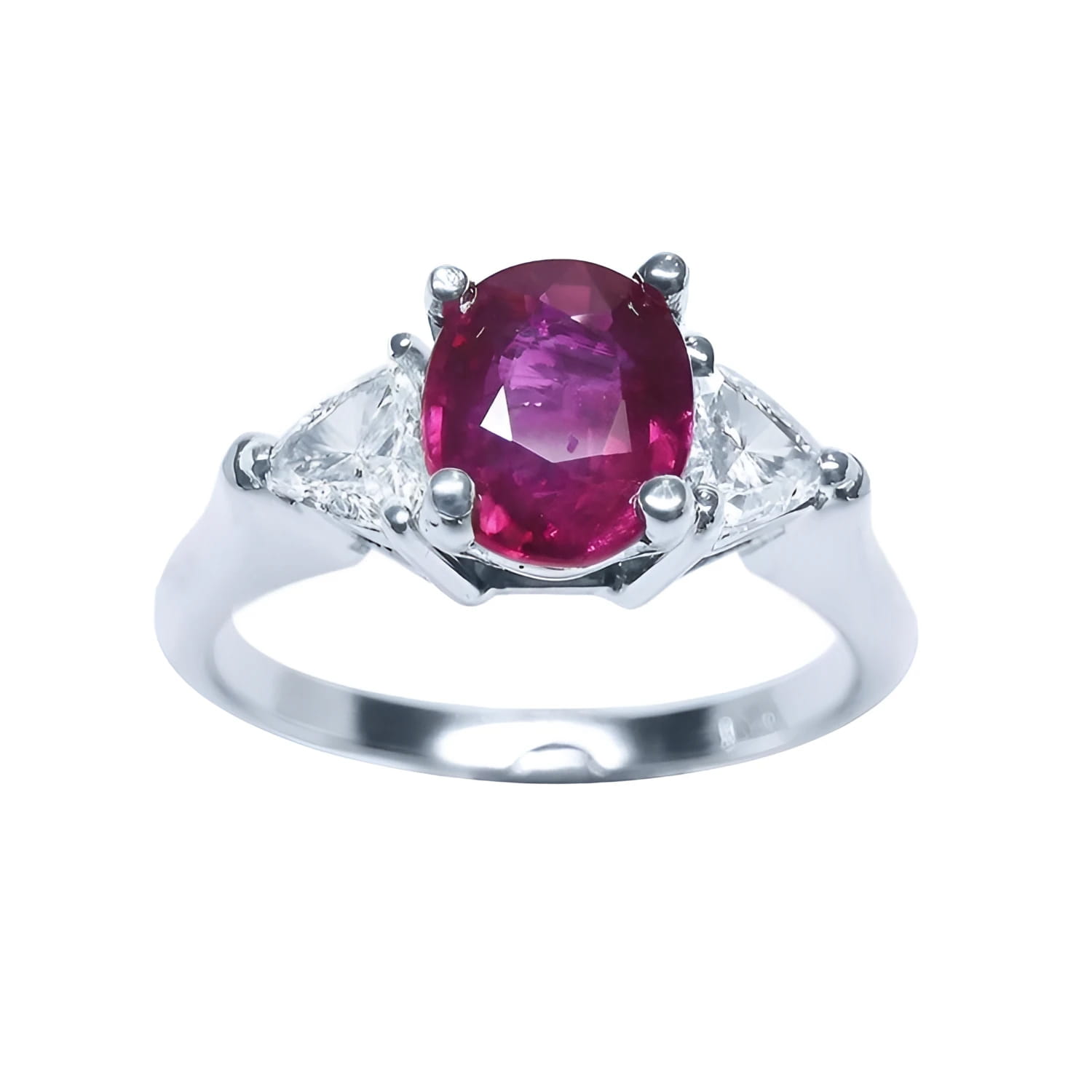 Women's 14k white gold ring with a deep red oval ruby and two trillion side diamonds.