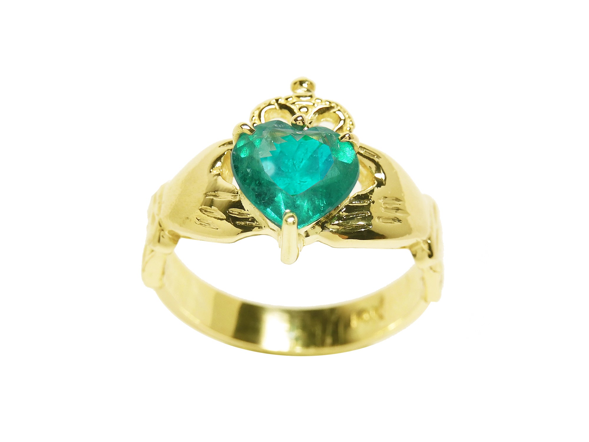 This emerald claddagh ring in yellow gold shows the heart topside profile gemstone and sideways.