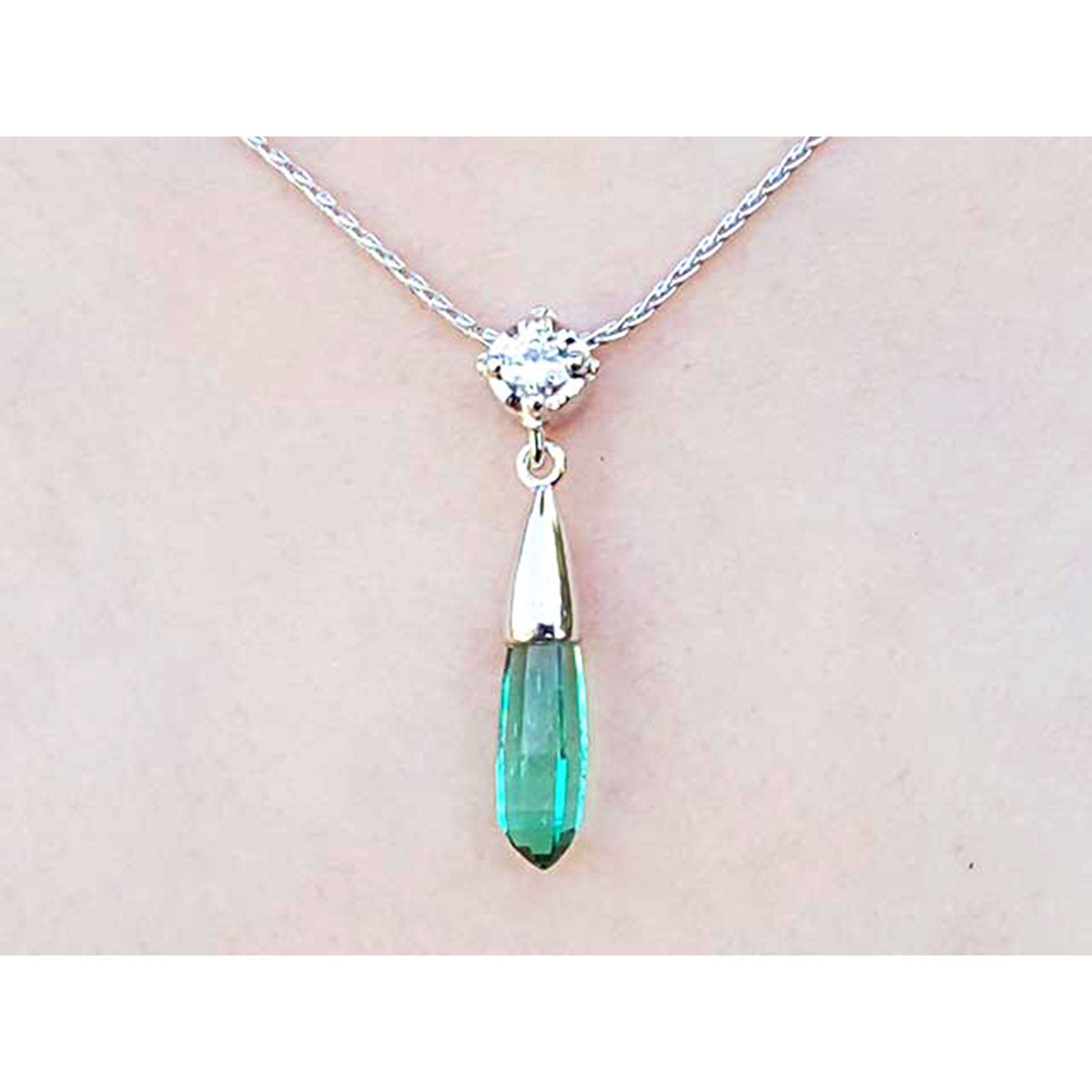 14k white gold emerald and diamond briolette necklace with a natural diamond on top slider bail and 18&quot; inches chain