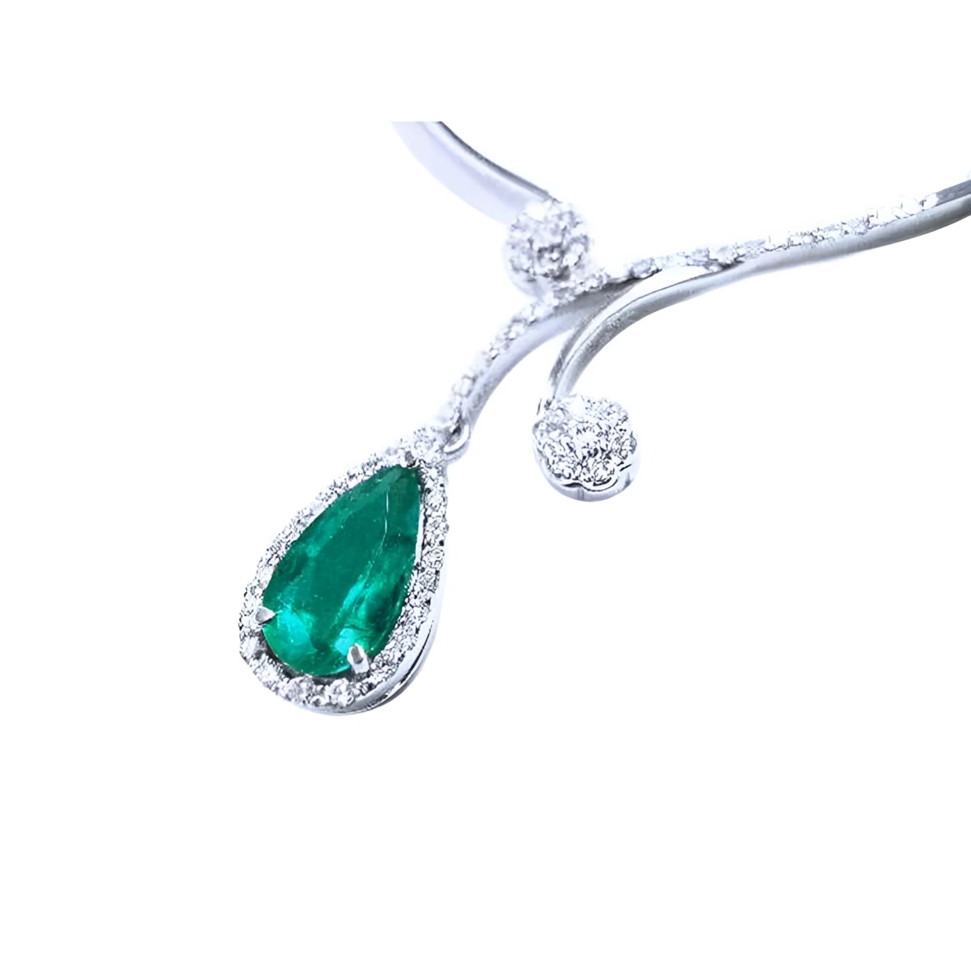 Pear cut deep green emerald necklace with diamond halo and accents, set in 18K white gold.