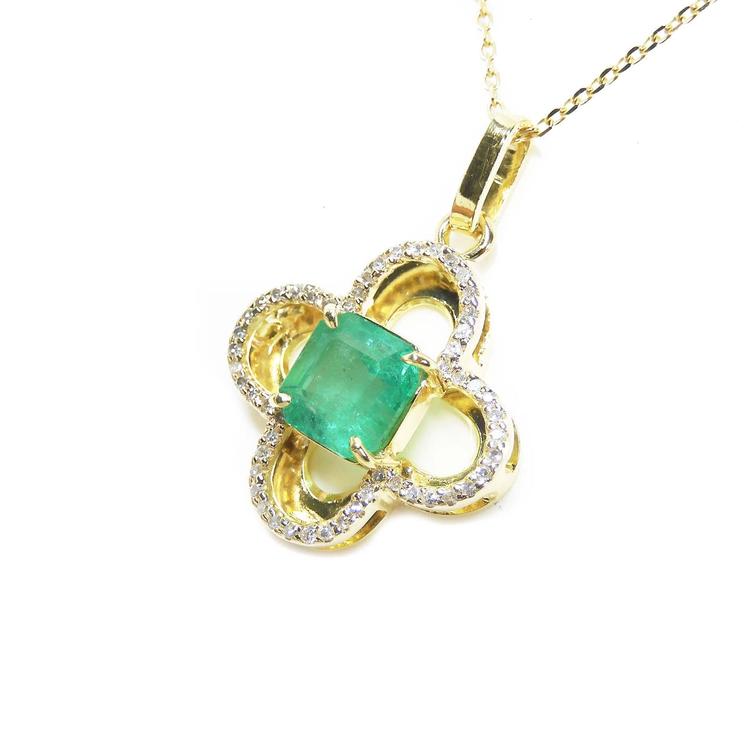 14K gold clover pendant with a square natural emerald and diamond accents.