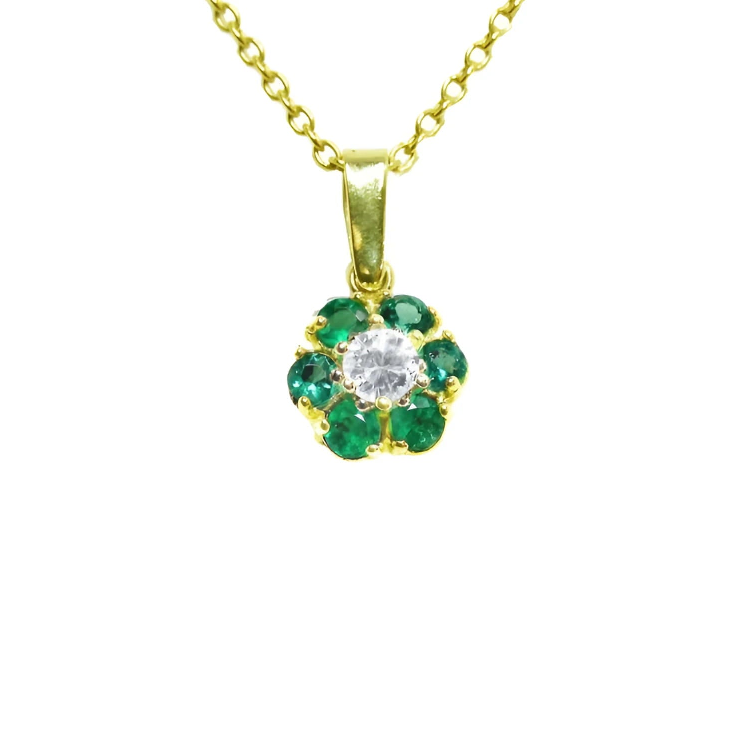 18K yellow gold cluster pendant with a center diamond surrounded by emeralds.
