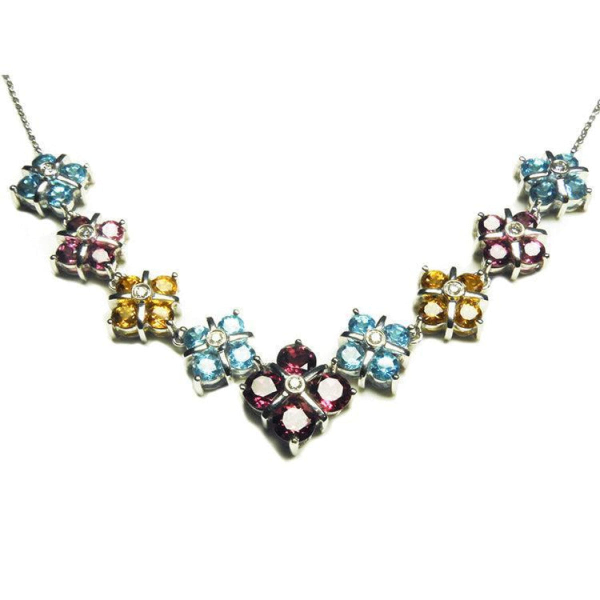 18K white gold necklace with X-cluster links, featuring tri-colored topaz and diamond accents.