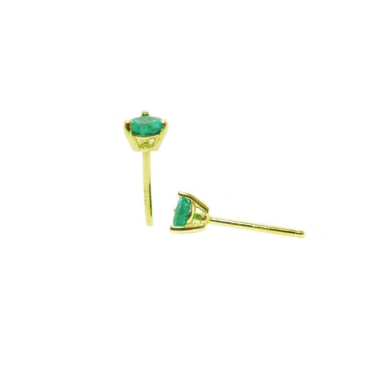 Medium deep natural emerald stud earrings in three-prong 14K yellow gold setting.