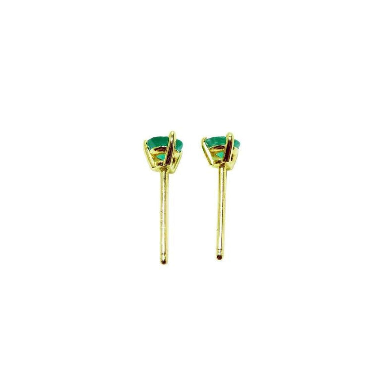 Pair of medium deep green emerald stud earrings in 14K yellow gold with three prongs.