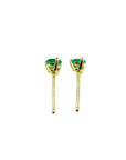 Pair of medium deep green emerald stud earrings in 14K yellow gold with three prongs.