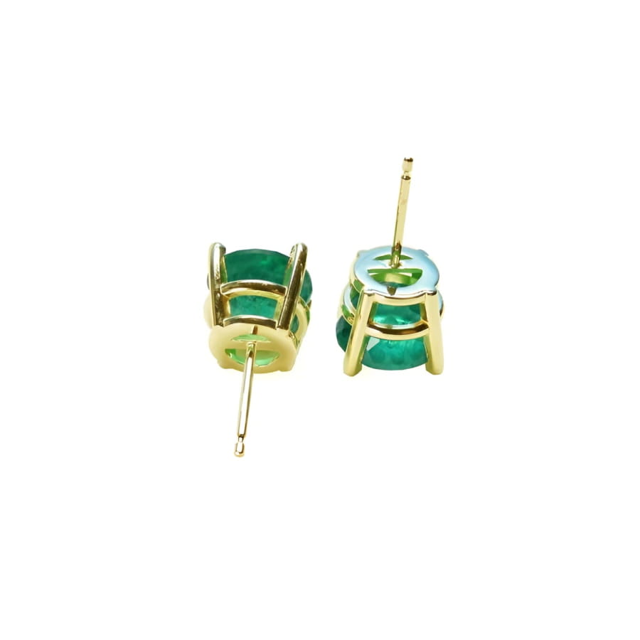 4.38 ct bluish-green Colombian emerald stud earrings in 14K yellow gold prong settings.