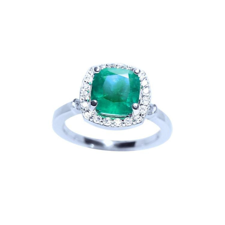 Women's ring with a cushion cut natural colombian emerald with a halo diamond, white gold.