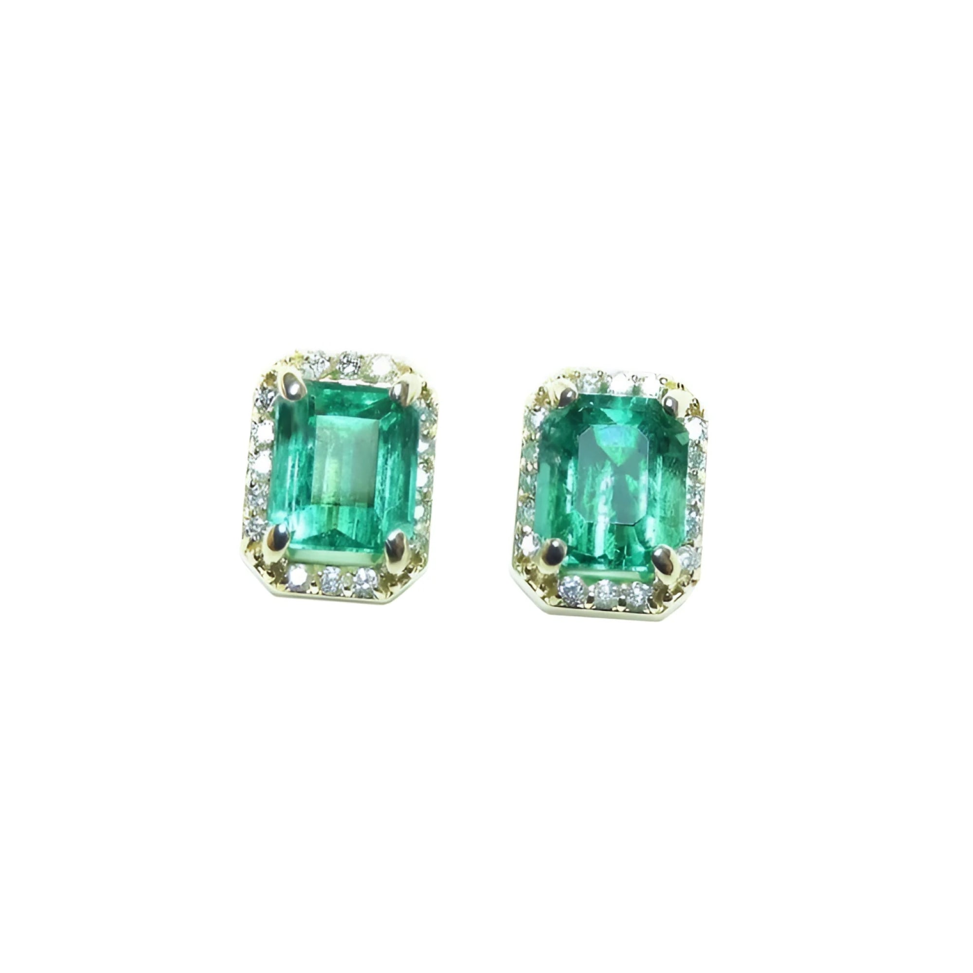 Pair of natural colombian emerald stud earrings with a halo diamond in 14k gold.