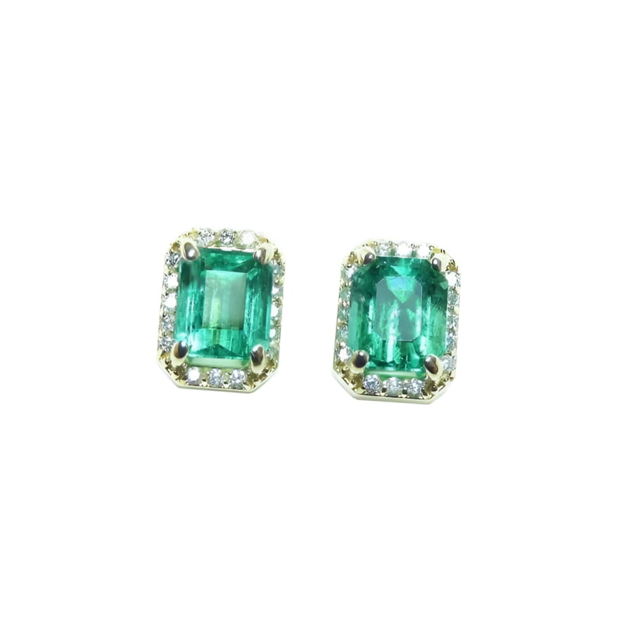 Pair of natural colombian emerald stud earrings with a halo diamond in 14k gold.