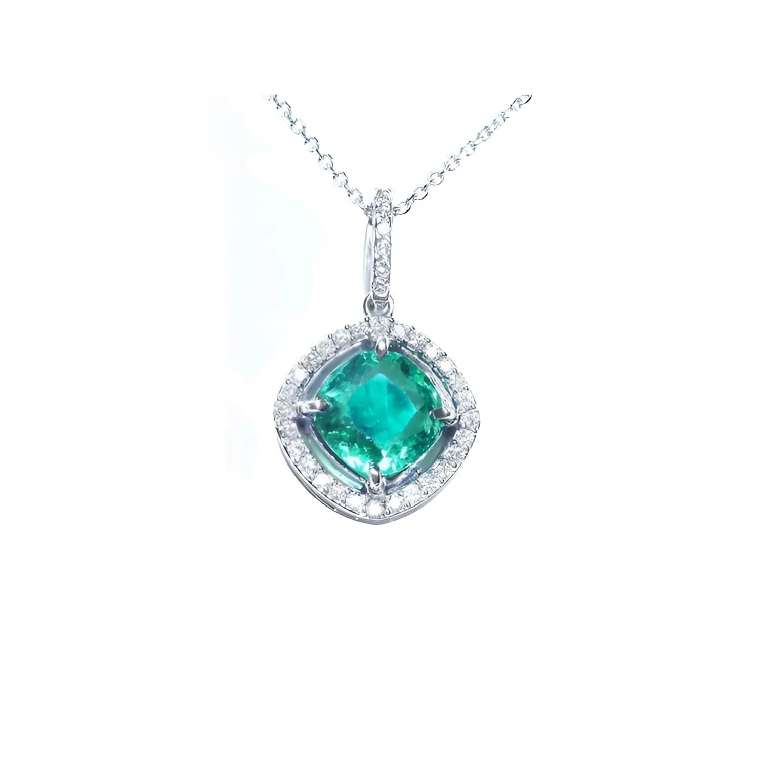 Cushion-cut Colombian emerald pendant with diamond halo in 14K white gold, on a delicate chain.
