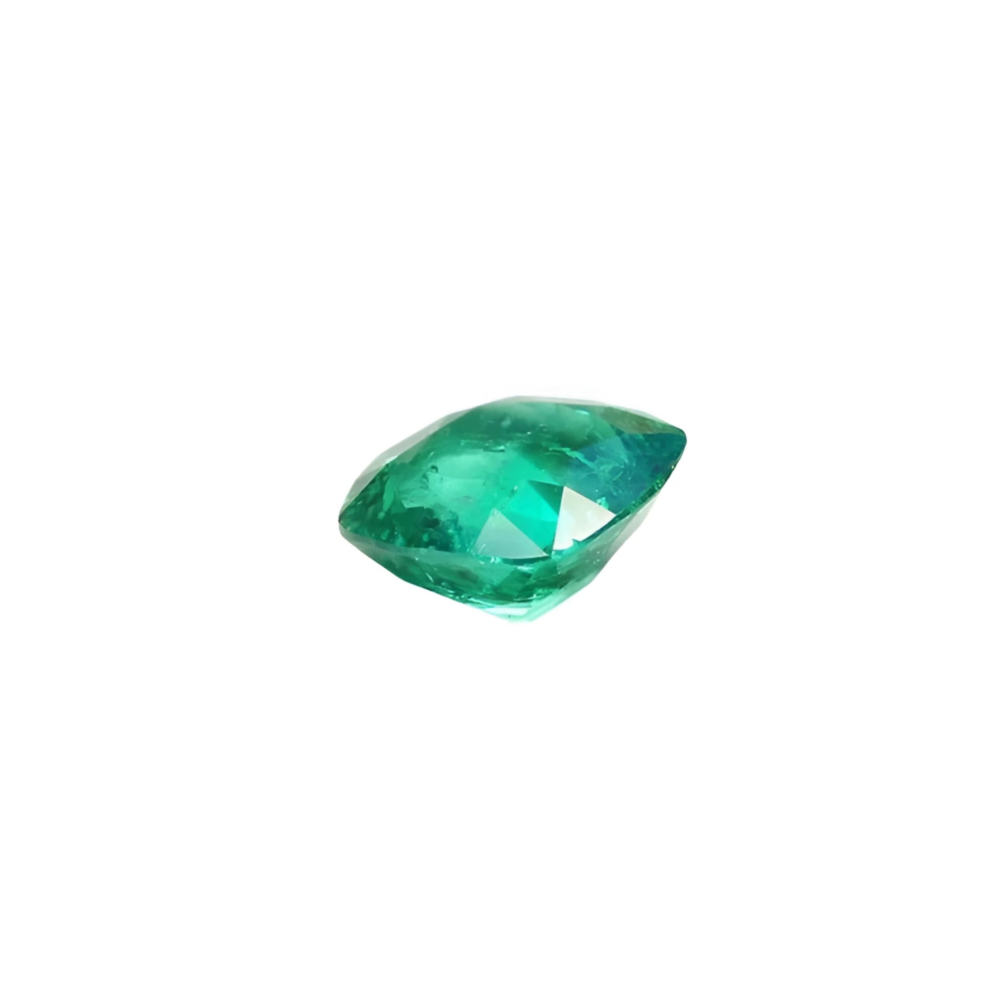 GIA certified 1.62 carat cushion cut emerald with vibrant medium-deep bluish-green hue.