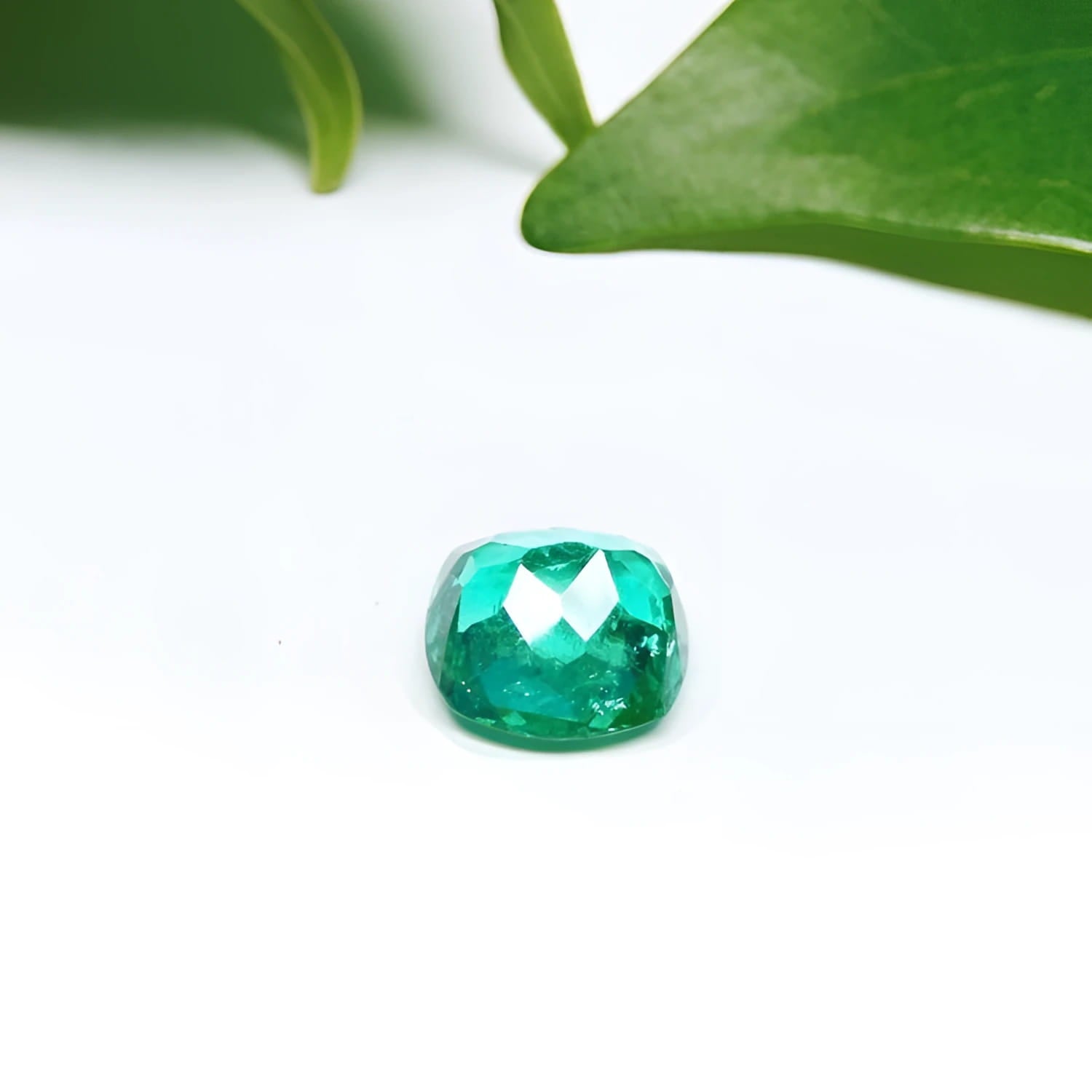 1.62 carat GIA certified emerald, cushion cut, vibrant medium-deep bluish-green.
