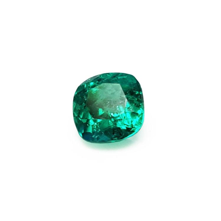 Cushion-shaped loose natural colombian emerald sourced from the Muzo mines.