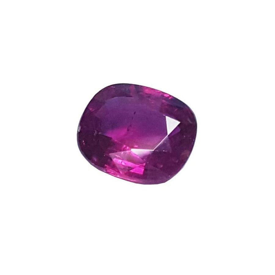 1.18 carat loose natural ruby gemstone with a cushion cut and vibrant red hue.