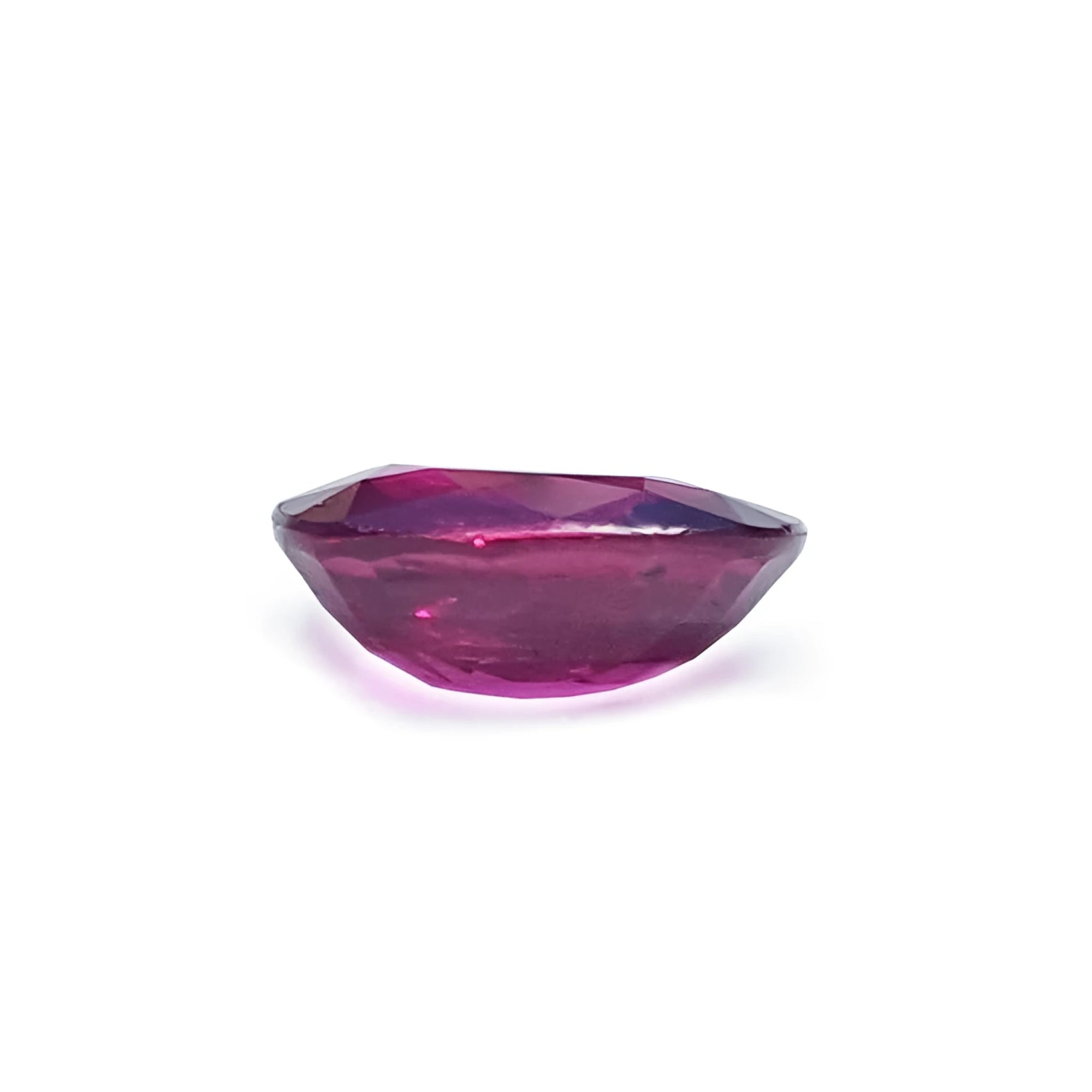 1.18 carat loose natural ruby gemstone with a cushion cut and vibrant red hue.