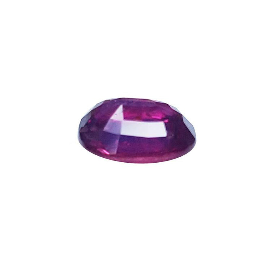 1.18 carat loose natural ruby gemstone with a cushion cut and vibrant red hue.