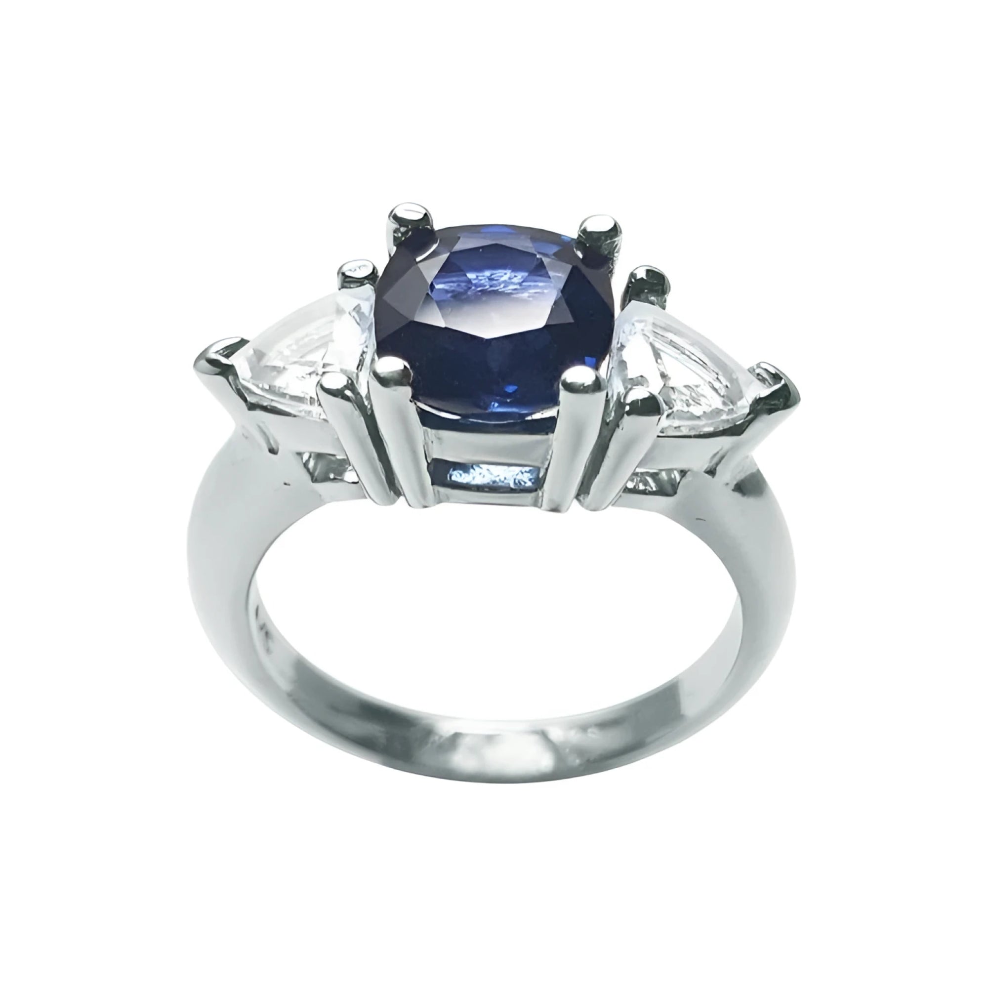 14K white gold cushion cut deep blue sapphire ring with trillion side sapphires.