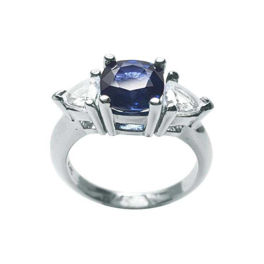 14K white gold cushion cut deep blue sapphire ring with trillion side sapphires.